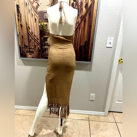 Tied Backless Split Thigh
Fringe Hem Halter Dress - Picture 8 of 11